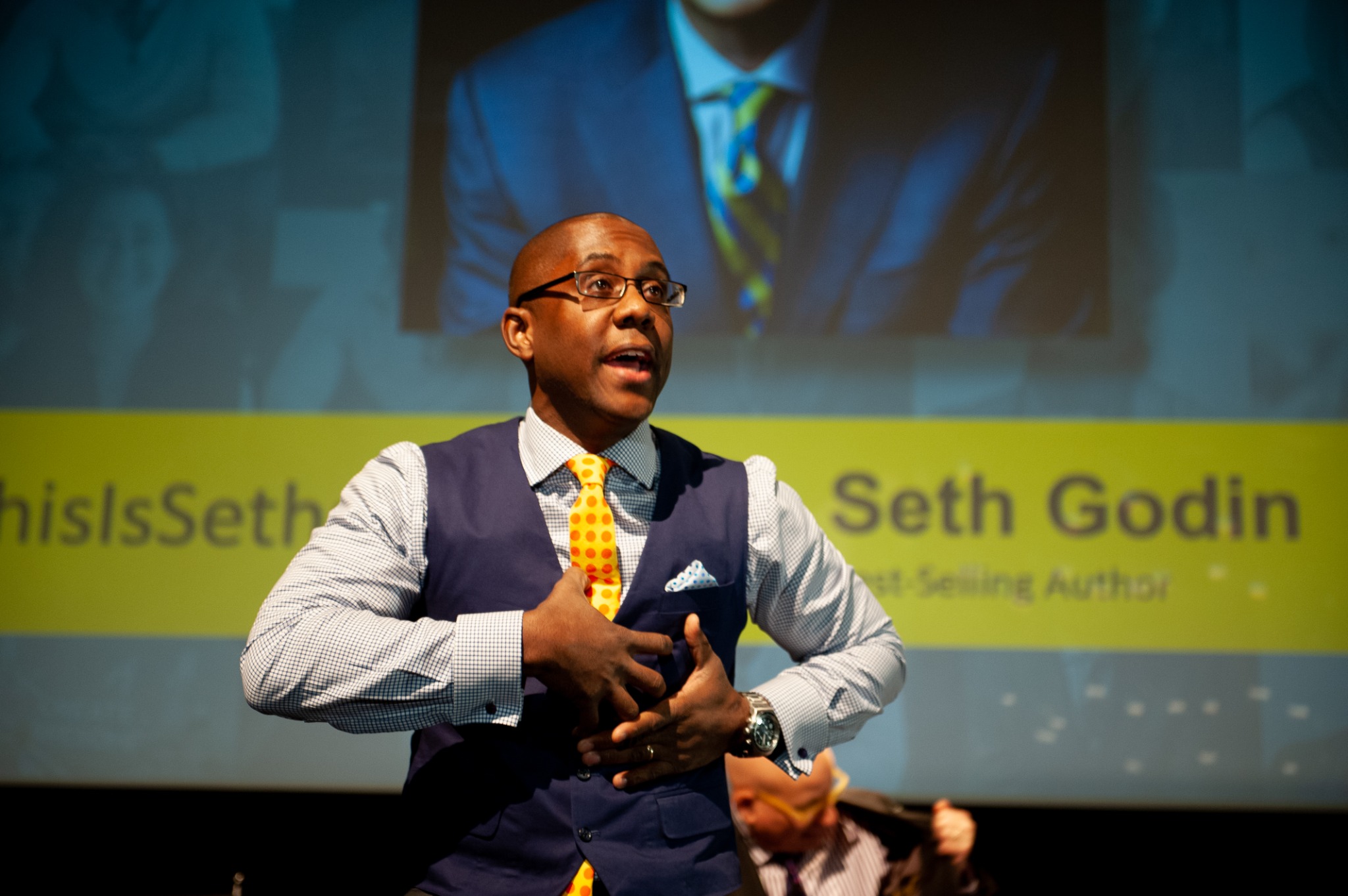 Ramon Ray speaking onstage